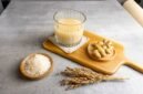 beras kencur on a glass isolated on grey background. jamu is good for diet and health