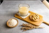 beras kencur on a glass isolated on grey background. jamu is good for diet and health