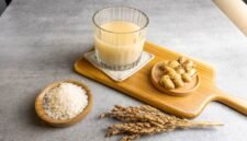 beras kencur on a glass isolated on grey background. jamu is good for diet and health